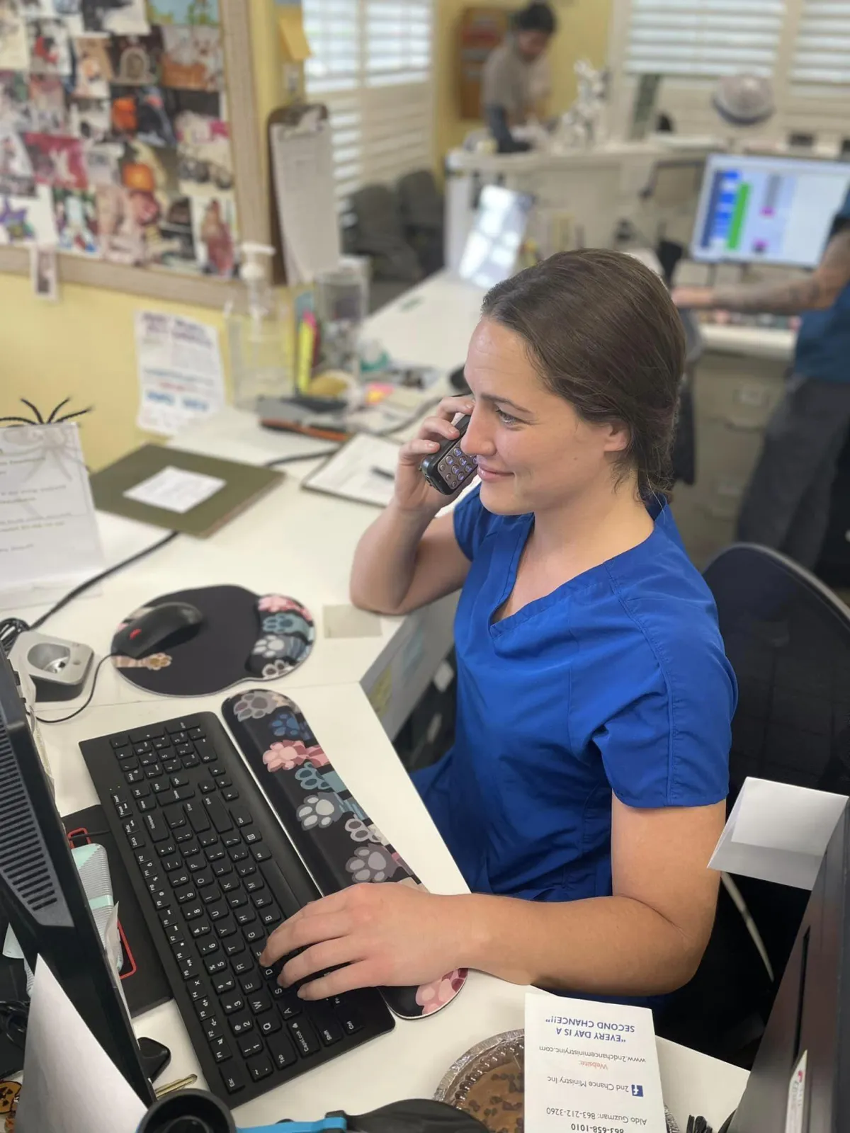 Friendly reception staff helping families